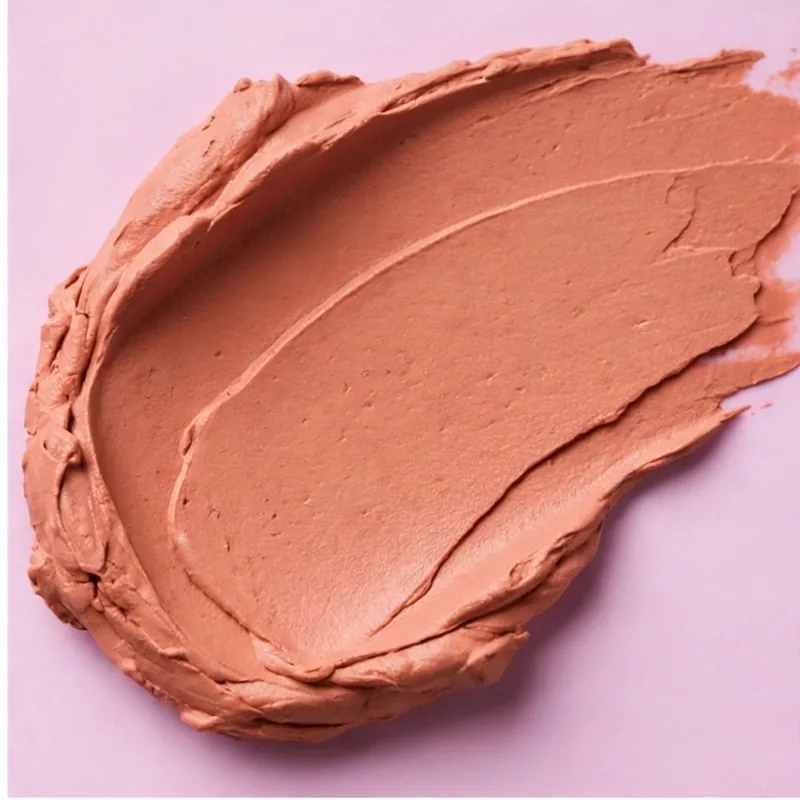 Terracotta-pink clay texture of the Fresh Skin Therapy Mask, smeared